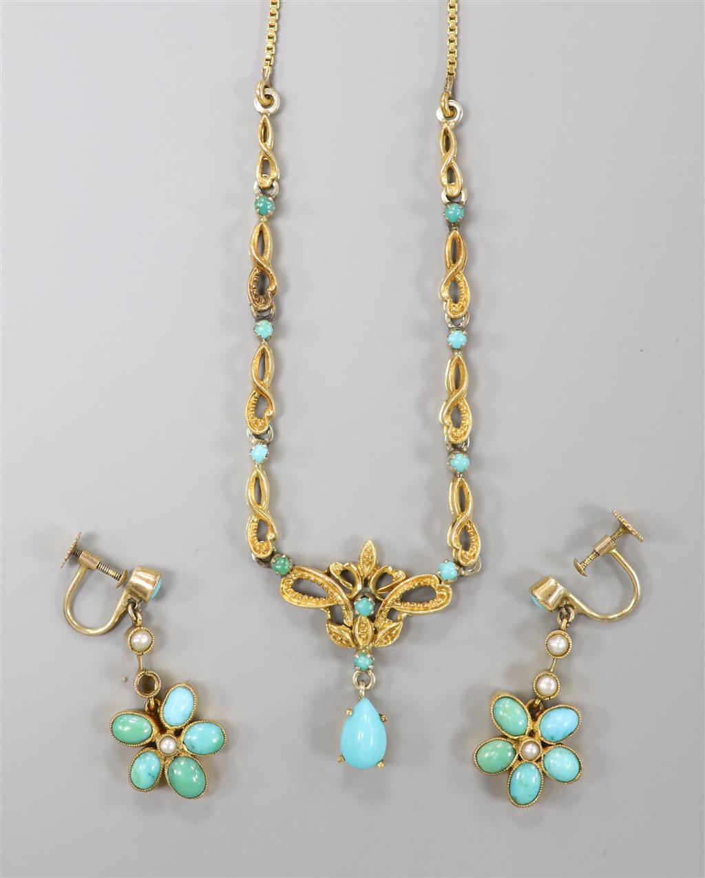 A yellow metal and turquoise set drop pendant necklace, 44cm, gross 9.6 grams and a pair of earrings